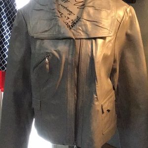 Silver distressed jacket. Zipper front, pockets Detailed collar. Excellent shape